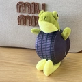 Detail of the unique green frog plush keychain with purple checkered turtle shell - 19cm Tire Frog
