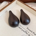 Close-up of smooth dark brown wood water-drop pendant earrings for women's vintage jewelry set - Black Stud Earrings (Silver Pin)