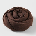 Brown cotton linen scarf in a rose roll shape featuring soft knit texture - Coffee