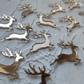 Macro shot of silver mirror acrylic reindeer cake charms for Christmas decorations - 12Pcs Christmas Deer - Gold