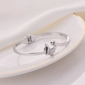 Elegant frosted butterfly open bangle with a clear zircon stone in silver finish - Butterfly Bangle / Steel