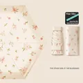 Mini floral folding umbrella in light beige with durable fiber frame and storage case - 6-Fold Equinox Orchid - UV Protection Black Glue