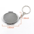 Oval silver foldable makeup mirror keychain with polished stainless steel finish - Oval Mirror Style / Silver