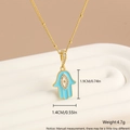 18k vergoldeter Hamsa-Hand-Anhänger mit blauem Emaille, Maße 1,9 cm mal 1,4 cm - Vergoldet Blaue Hand Weißer Zirkonia (NT12-4)