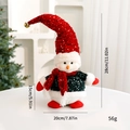 Cute snowman Christmas figurine with red sequin hat and green outfit for festive decoration - Snowman - Sitting