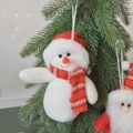Christmas snowman plush hanging ornament with red striped scarf on a festive tree branch - Red Snowman Hanging Ornament 15cm