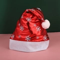 Red plush Christmas hat with white snowflake patterns and soft faux fur trim - Red Metallic Fabric Snowflake Hat
