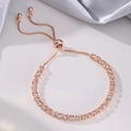 Detail of rose gold tennis bracelet with adjustable slider and pavé round zircons - Single Row Zirconia / Rose Gold