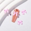 Décoration d'ongles 3D avec nœud en résine rose sur faux ongle long de couleur chair - Rose