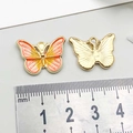 Orange enamel butterfly pendant in alloy metal showing 22mm size on scale - 1Pc Orange & Yellow Drip Oil Butterfly / 15*20mm