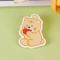 Cute cream yellow acrylic bear pin with a crown and red apple for backpacks - Apple Eating Bear
