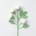 Detailed view of hand-knitted white crochet flowers with green stems and leaves - Finished Bubble Rose (4 Heads White)