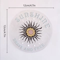 Detail showing a 12cm sunflower suncatcher prism sticker with rainbow PVC texture - RPS056: Golden Sunflower Sunshine