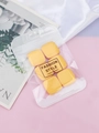 Detailed view of six mini square yellow finger puffs in a clear zip storage bag - 6Pcs Square Yellow + OPP Bag