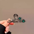 Detailed view of hand-held small claw clip with green crystals and white pearls - 12# Tulip Alloy Hair Clip (Approx. 6.5CM)