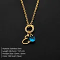 14K gold plated titanium steel necklace with letter E and round blue gemstone pendant - Letter E