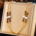 Vintage gold necklace with tiger eye stone and pearl pendants in a beige jewelry box - Double Layer Pearl Tiger Eye Style (N3070)
