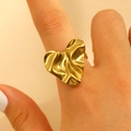 Golden irregular heart ring with crumpled texture on finger for a stylish look - 18K Gold Plated Irregular Pleated Heart (8840)