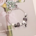 Macro detail of DIY charm bracelet featuring purple frosted beads and crystal butterfly - Purple Butterfly Dice Style(7#)