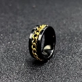 Men's black stainless steel spinner ring featuring an inlaid golden Cuban link chain - Black with Gold Chain