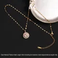 Golden titanium steel spinning clover necklace with pink zircon floral pendant - Pink Zirconia Sunflower (A693)