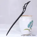 Elegant 23cm black ebony wood hair stick with intricate hollow carved wing design - Flying Feather - 23cm