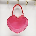 Borsa trasparente rosa a forma di cuore con manico in perline rosse per accessori - Rosso