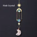 Pink crystal moon suncatcher with golden sun and star charms on black background - Pink Crystal Moon Wind Chime Pendant