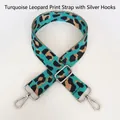 Detail of emerald green leopard print nylon bag strap with silver metal swivel hooks - Emerald Green + Silver Hook