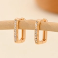 Macro detail of geometric gold-plated hoop earrings with micro-pave cubic zirconia crystals - EH224 Rectangular Gold Pave