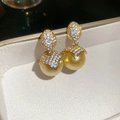 Elegant gold pearl earrings featuring sparkling diamond bows in a white jewelry gift box - 18K Gold Plated Silver Pin Zirconia Pearl Stud Earrings