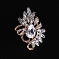 Elegant gold crystal brooch with pear-shaped main stone and rhinestone details - MM-BR-0023 / Gold