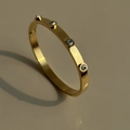 Polished 18k gold-plated evil eye bangle with blue enamel and sparkling cubic zirconia - Gold Evil Eye