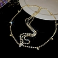 Close-up of luxury multi-layer gold rhinestone head chain with shimmering crystal pendants - Multi-layer Rhinestone Headpiece (Gold) / Gold