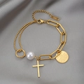 Bracciale in titanio dorato con perle, ciondolo a croce e charm rotondo su seta - Oro