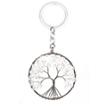 Silver tree of life keychain featuring clear crystal stones on a clean white background - Clear Quartz Round Scattered