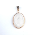 Oval white turquoise pendant in golden frame, elegant gemstone jewelry for necklaces - Howlite