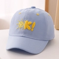 Close-up of light blue kids baseball cap featuring yellow OK sun embroidery and cotton texture - 52cm 2-5 Years Old / Letter OK-Light Blue