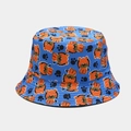 Detailed view of the double-sided bucket hat featuring blue fabric with orange lion prints - M (56-58cm) / Blue Cartoon Lion Footprint Print