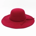 Detail view of the wide-brimmed red wool felt fedora hat with a matching ribbon bow - One Size(58cm) / Brick Red