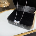 Silver titanium necklace with an elegant white pearl bow pendant on a delicate link chain - Bow Pearl Opal Pendant (X966 Silver)
