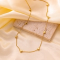 Gouden hartjes hanger ketting van titanium staal op decoratieve steen en zijde - Qyh24 Horizontale Acht Harten Ketting Goud