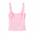 Detailed close-up of pink elastic tank top featuring a wide strap and neat bow ornament - XS / Pink
