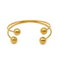 Minimalistische dubbellaagse gouden manchetarmband met gepolijste bolvormige uiteinden - Gouden Armband (KA1080)