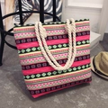 Ethnic style canvas tote bag with colorful geometric patterns and thick rope handles - Pink Floral