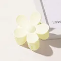 Detailed view of a matte yellow flower-shaped hair claw clip with a five-petal design - Matte Flower Hair Clip - White