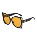 Lunettes de soleil carrées oversize avec monture noire et verres orange vibrants - Monture Noire Verres Jaunes