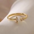 Macro shot of 18K gold plated copper ring with marquise and round cut zircon gems - Adjustable Open / Gold with Transparent Double Stones (13836)
