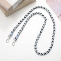 Detail of woven crossbody strap with blue, black, and white V-patterns and metal clasps - 12mm Width / Black White Blue