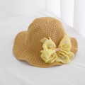 Close-up view of a straw sun hat for girls featuring a large yellow daisy lace bow - Big Bow White / Circumference 50-53cm / Khaki